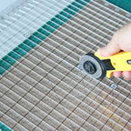 Fabric cutter with clamp for precise cuts