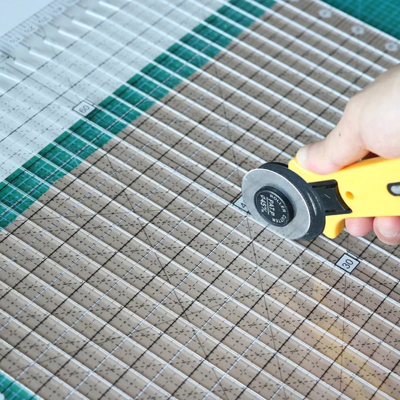 Fabric cutter with clamp for precise cuts