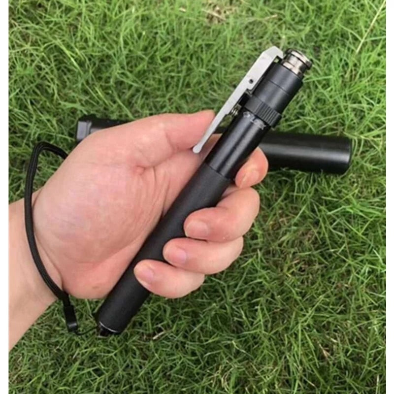 Collapsed telescoping stick resting securely in one hand