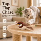 Cat tapping the flapping bird toy on a scratching platform