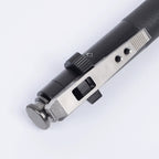 Close-up of the metal release mechanism and textured grip
