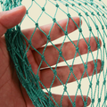 Close-up of UV-resistant garden netting mesh for bird and deer protection