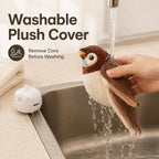 Removable plush bird cover being rinsed for cleaning