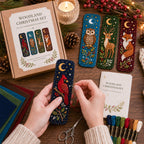 Hands stitching a cardinal bookmark from the woodland set